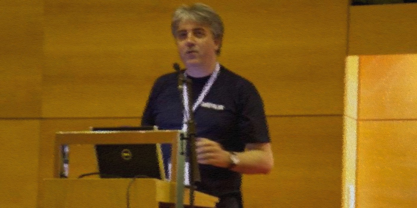A much younger Dave speaking at a Perl conference